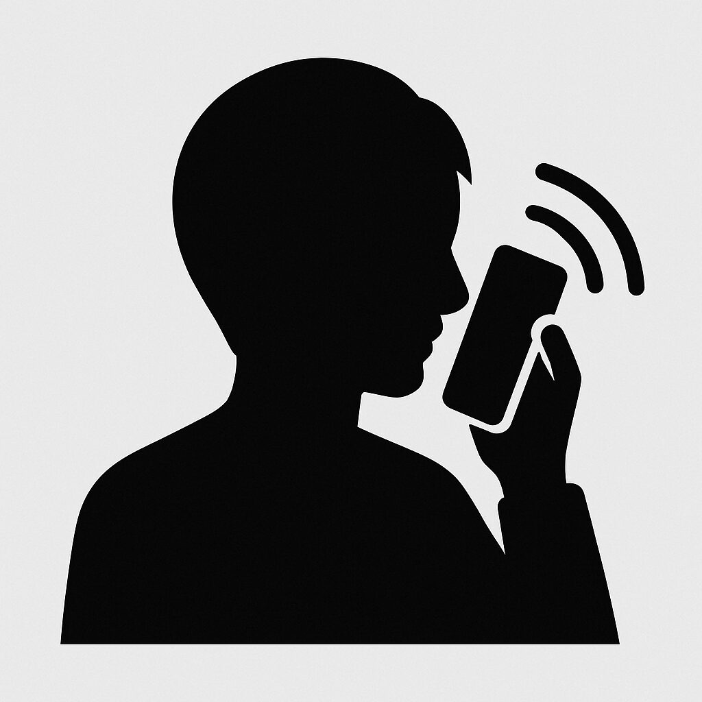 スマホで国際電話をしている人物のシルエットイラスト。無料素材サイトで入手できるイメージ。