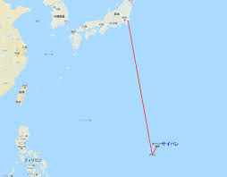 サイパン 国番号 +1-670 解説用:海と白い砂浜の写真(国際電話のかけ方イメージ)