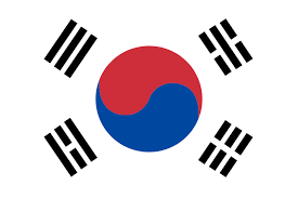 韓国ソウルの市街地とタワーの風景写真。高層ビル群と山並みが見える広い構図(無料素材サイトで取得可能なイメージ)